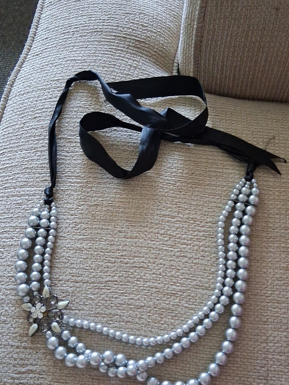 Silver Multi-Strand Faux Pearl Necklace with Black Ribbon and Floral Accent